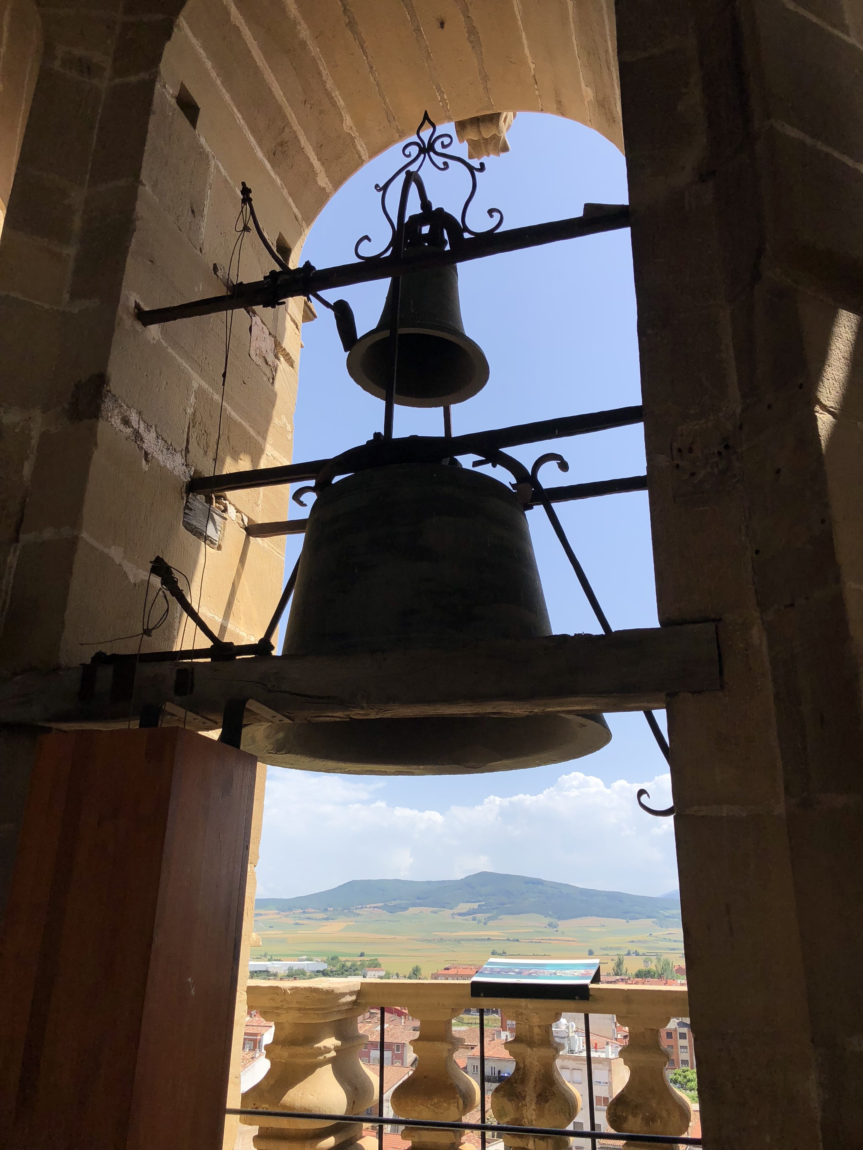 Bell with view of town.